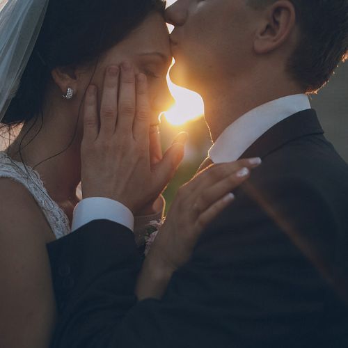 Bride and groom share an intimate sunset moment on their wedding day at Western Ridge.